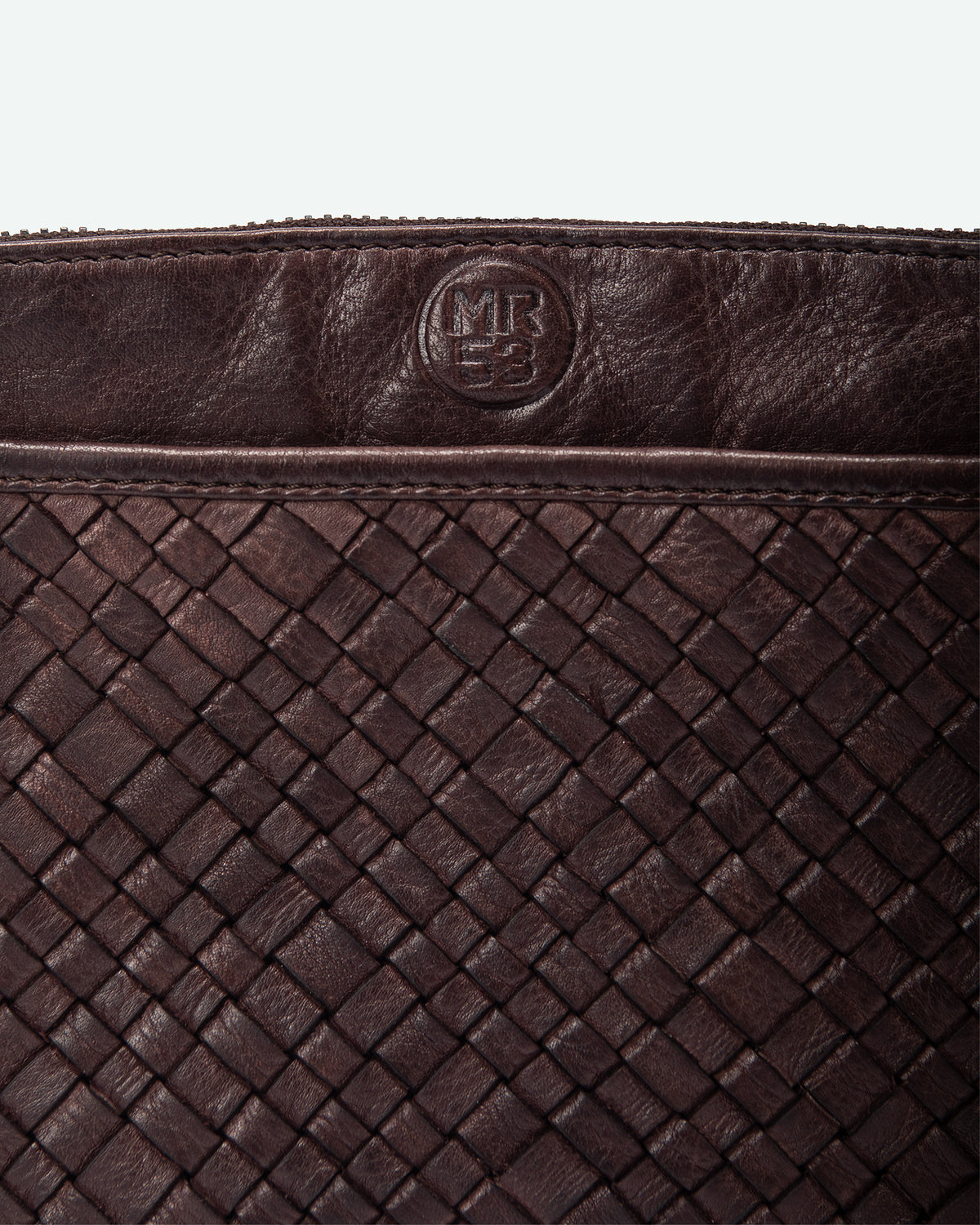 Selvino men's leather clutch with woven pocket