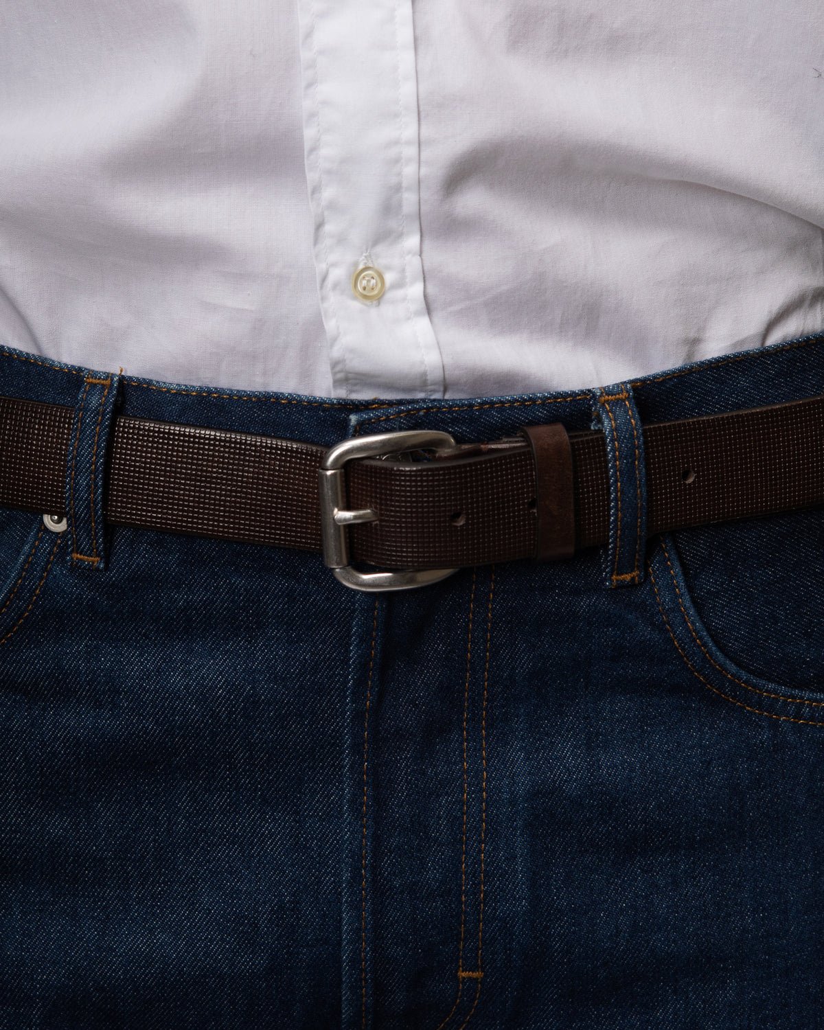 Cintura uomo Poieto in pelle goffrata a griglia